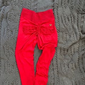 Cute Booty leggings Red size large fits Medium Super stretchy n soft
